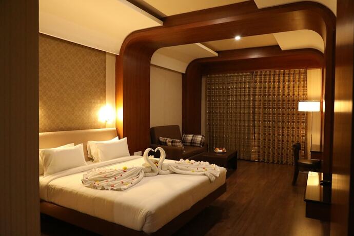 Imagen de la habitación del Hotel The Thangam Grand. Foto 16