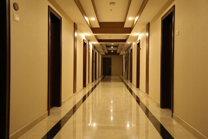 Imagen de la habitación del Hotel The Thangam Grand. Foto 17