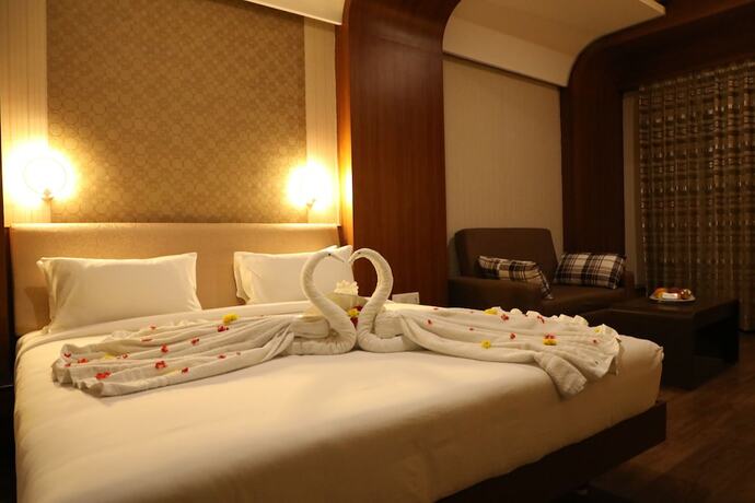 Imagen de la habitación del Hotel The Thangam Grand. Foto 19