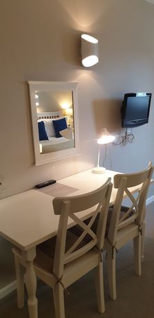Imagen de la habitación del Hotel The Thatch Inn. Foto 12