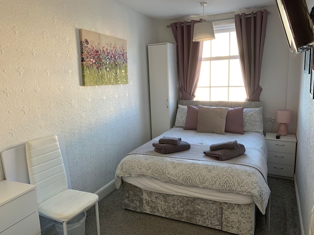 Imagen de la habitación del Hotel The Thoresby Guest House Scarborough. Foto 10