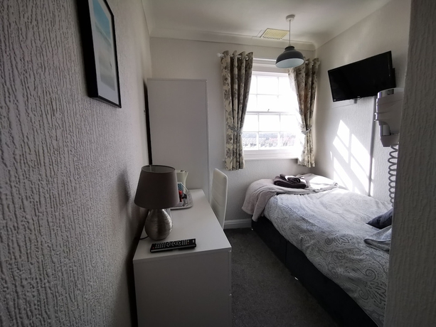 Imagen de la habitación del Hotel The Thoresby Guest House Scarborough. Foto 12