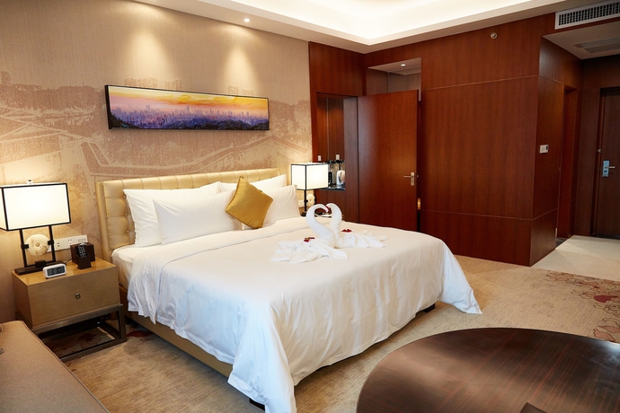 Imagen de la habitación del Hotel The Thousand Lantern Lake. Foto 18