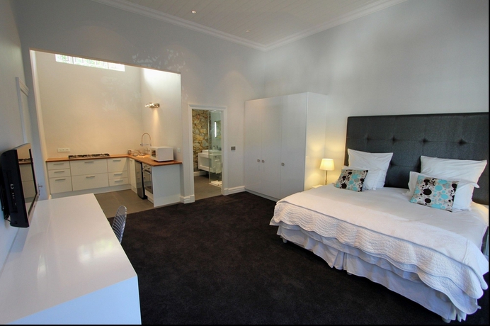 Imagen de la habitación del Hotel The Three Boutique. Foto 6