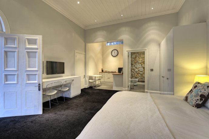 Imagen de la habitación del Hotel The Three Boutique. Foto 8