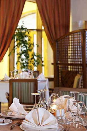 Imagen del bar/restaurante del Hotel The Three Corners Fayrouz Plaza Beach Resort. Foto 2