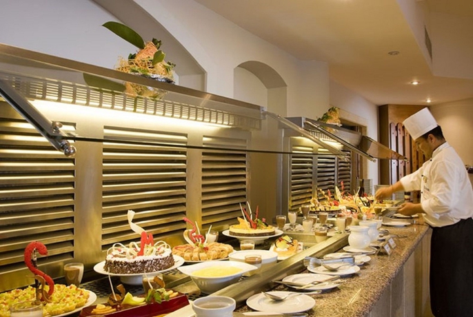 Imagen del bar/restaurante del Hotel The Three Corners Fayrouz Plaza Beach Resort. Foto 7