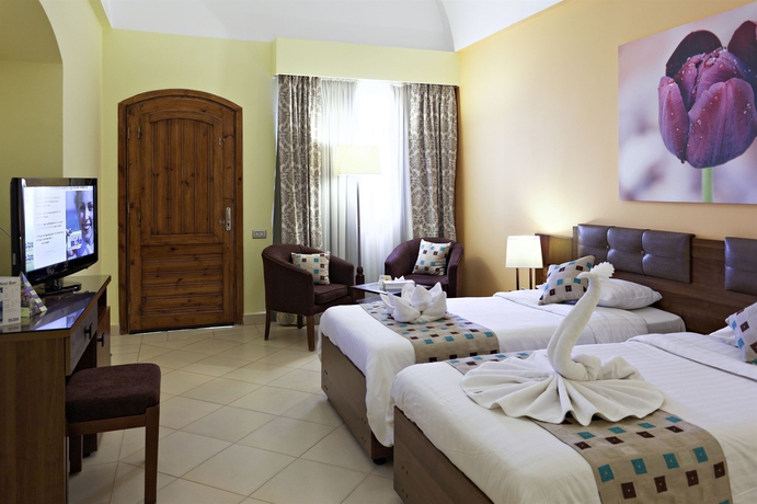 Imagen de la habitación del Hotel The Three Corners Rihana Resort. Foto 3