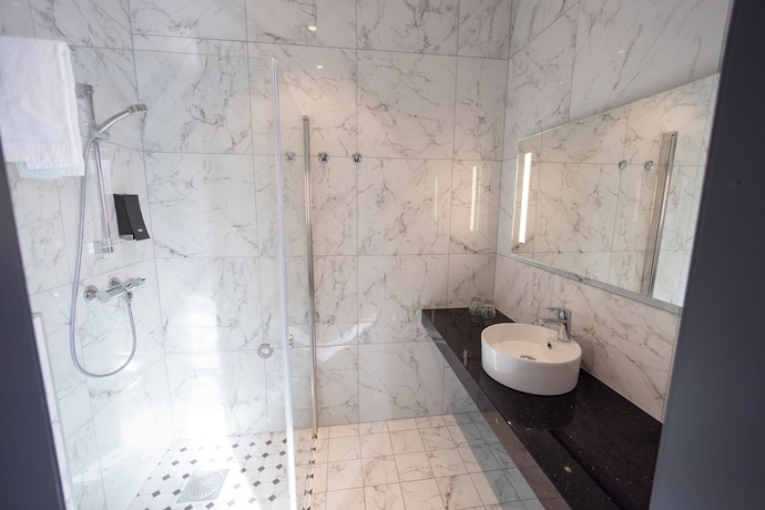 Imagen de la habitación del Hotel The Tide. Foto 13