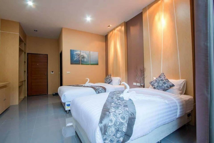 Imagen de la habitación del Hotel The Tide Resort. Foto 10