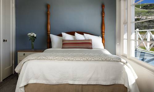 Imagen de la habitación del Hotel The Tides Oceanview Inn and Cottages. Foto 12