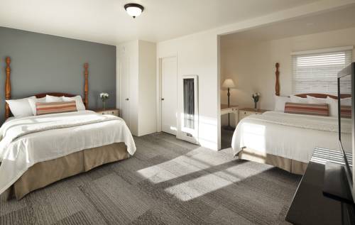 Imagen de la habitación del Hotel The Tides Oceanview Inn and Cottages. Foto 13