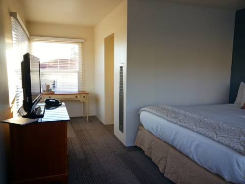 Imagen de la habitación del Hotel The Tides Oceanview Inn and Cottages. Foto 16