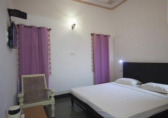 Imagen de la habitación del Hotel The Tiger. Foto 22