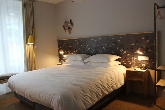 Imagen de la habitación del Hotel The Tilman. Foto 20