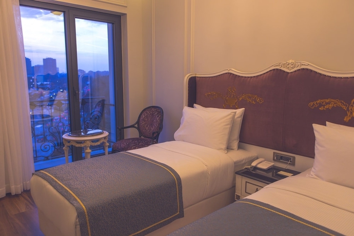 Imagen de la habitación del Hotel The Time Marina. Foto 12