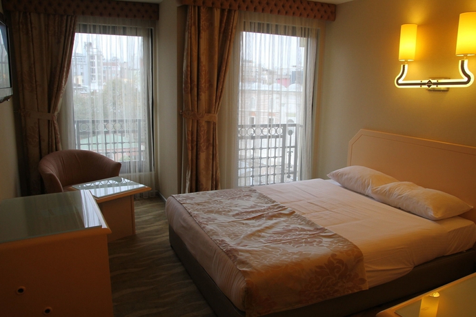 Imagen de la habitación del Hotel The Time Old City. Foto 7