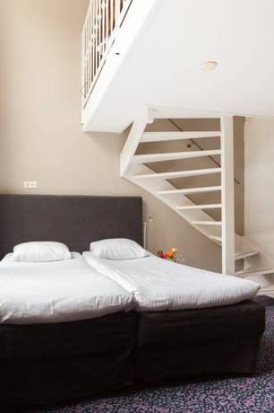 Imagen de la habitación del Hotel The Times. Foto 2