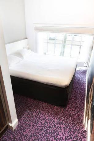 Imagen de la habitación del Hotel The Times. Foto 6