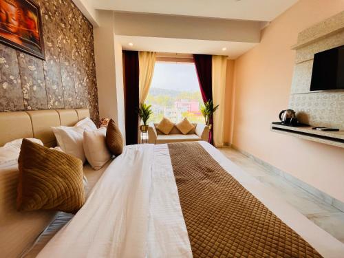 Imagen general del Hotel The Tirath Palace Luxury In Haridwar. Foto 12