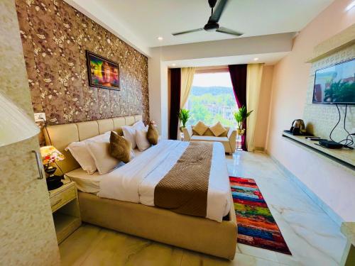 Imagen general del Hotel The Tirath Palace Luxury In Haridwar. Foto 16