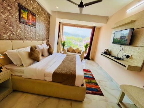 Imagen general del Hotel The Tirath Palace Luxury In Haridwar. Foto 19