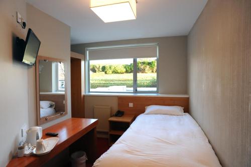 Imagen de la habitación del Hotel The Titan By Greene King Inns. Foto 9
