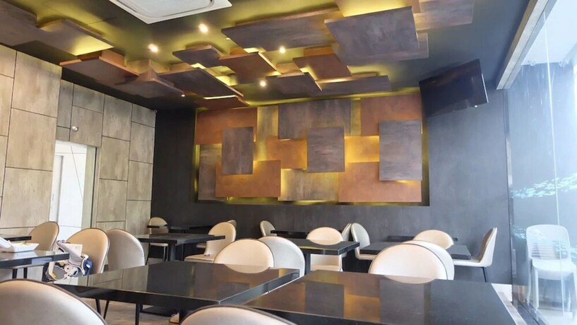 Imagen del bar/restaurante del Hotel The Tj Resort. Foto 16