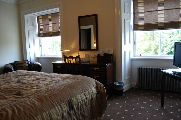 Imagen de la habitación del Hotel The Tontine. Foto 9