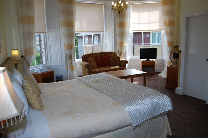 Imagen de la habitación del Hotel The Tontine. Foto 11