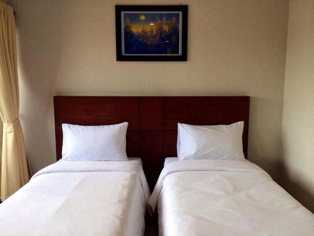 Imagen de la habitación del Hotel The Topaz Residence. Foto 12