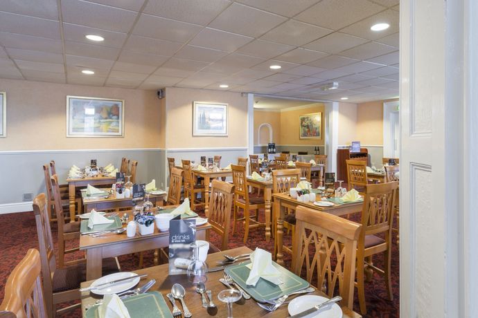 Imagen del bar/restaurante del Hotel The Tor Park. Foto 7