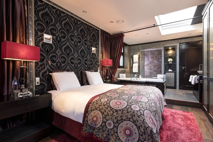 Imagen de la habitación del Hotel The Toren Amsterdam by The Pavilions. Foto 13