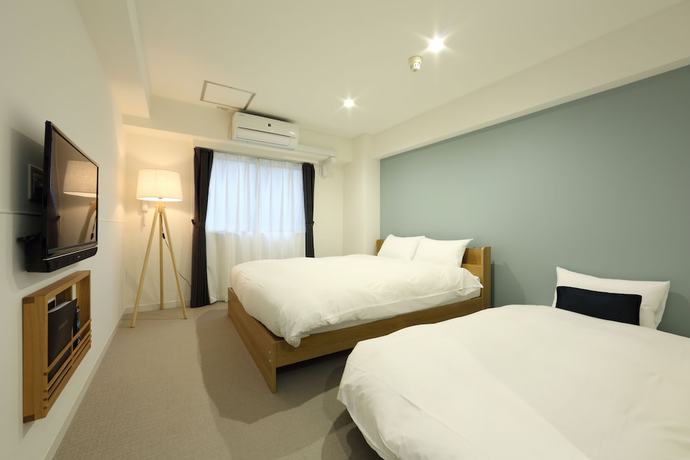 Imagen de la habitación del Hotel The Tourist Hotel Kasai. Foto 4