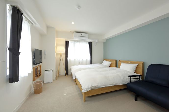 Imagen de la habitación del Hotel The Tourist Hotel Kasai. Foto 9