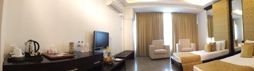Imagen de la habitación del Hotel The Tourmaline. Foto 5