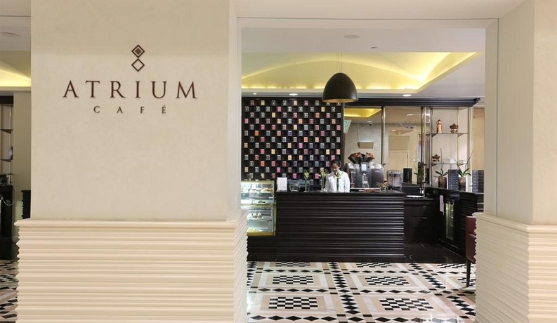 Imagen del bar/restaurante del Hotel The Tower Plaza. Foto 5