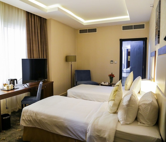 Imagen de la habitación del Hotel The Town Doha. Foto 8