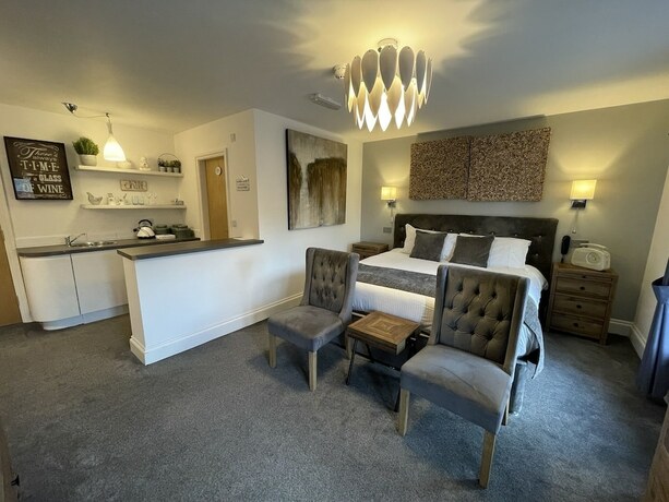 Imagen de la habitación del Hotel The Townhouse Boutique. Foto 16