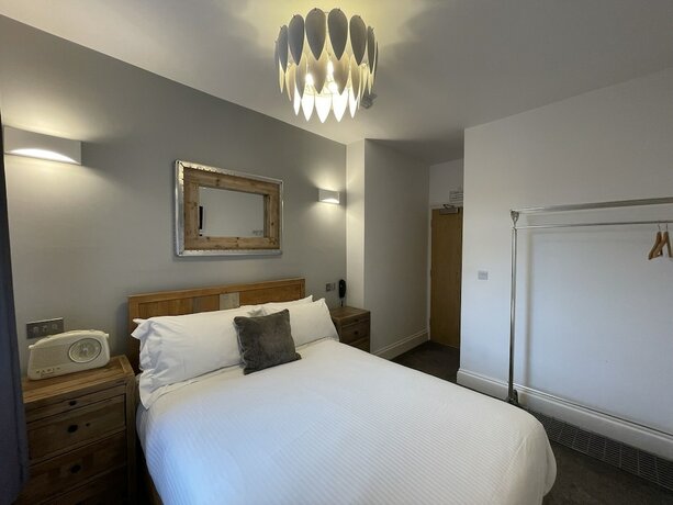 Imagen de la habitación del Hotel The Townhouse Boutique. Foto 18