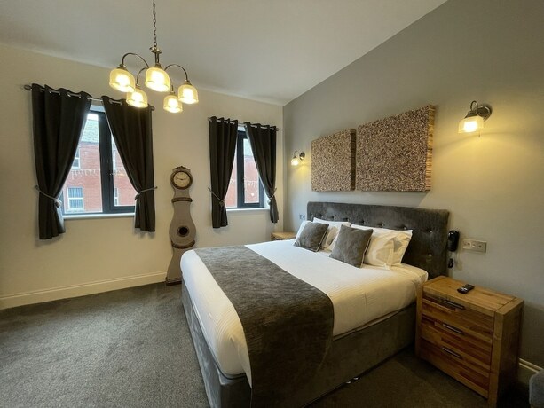 Imagen de la habitación del Hotel The Townhouse Boutique. Foto 19