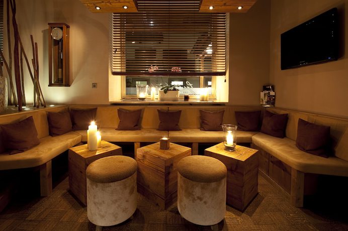 Imagen del bar/restaurante del Hotel The Townhouse Ruhpolding. Foto 2