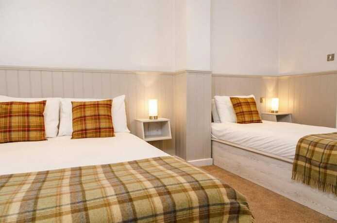 Imagen de la habitación del Hotel The Townhouse Sutton. Foto 17