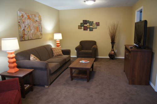 Imagen de la habitación del Hotel The Townhouses. Foto 11