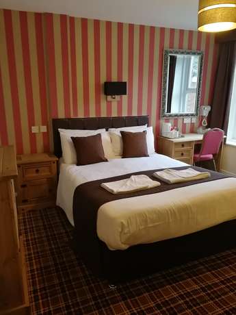 Imagen de la habitación del Hotel The Trafford. Foto 11