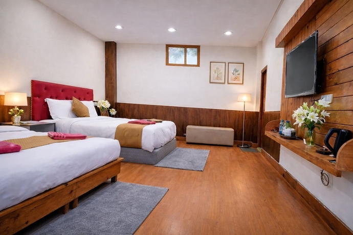 Imagen de la habitación del Hotel The Tranquil. Foto 7