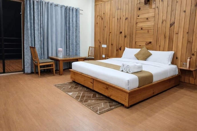 Imagen de la habitación del Hotel The Tranquil. Foto 9