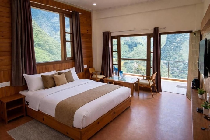 Imagen de la habitación del Hotel The Tranquil. Foto 10