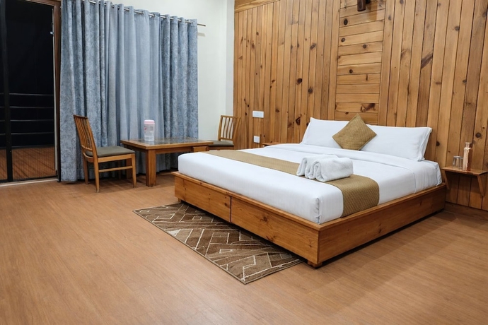 Imagen de la habitación del Hotel The Tranquil. Foto 14
