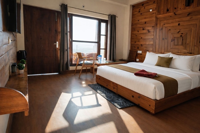 Imagen de la habitación del Hotel The Tranquil. Foto 15